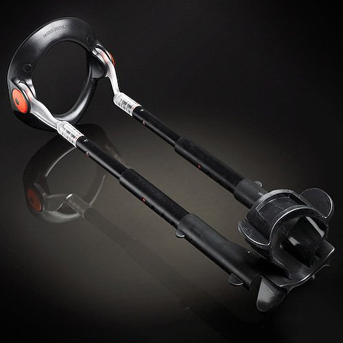 Male Edge Pro adjustable device with black and silver components on a dark background
