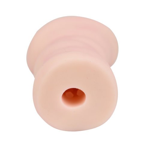 Loving Joy soft textured stroker with rounded opening and pale skin tone